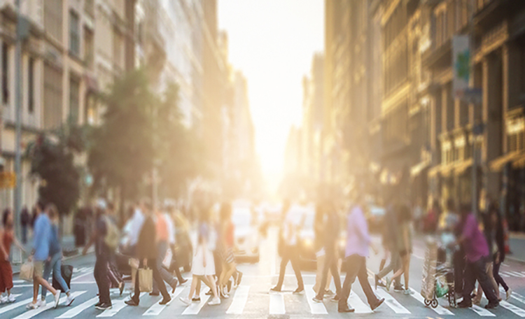 Pedestrians Walking Through Urban Setting