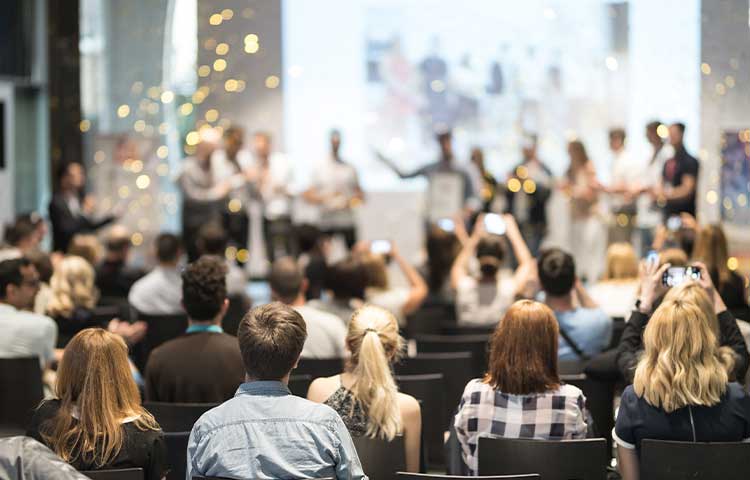 A group of people at an award ceremony