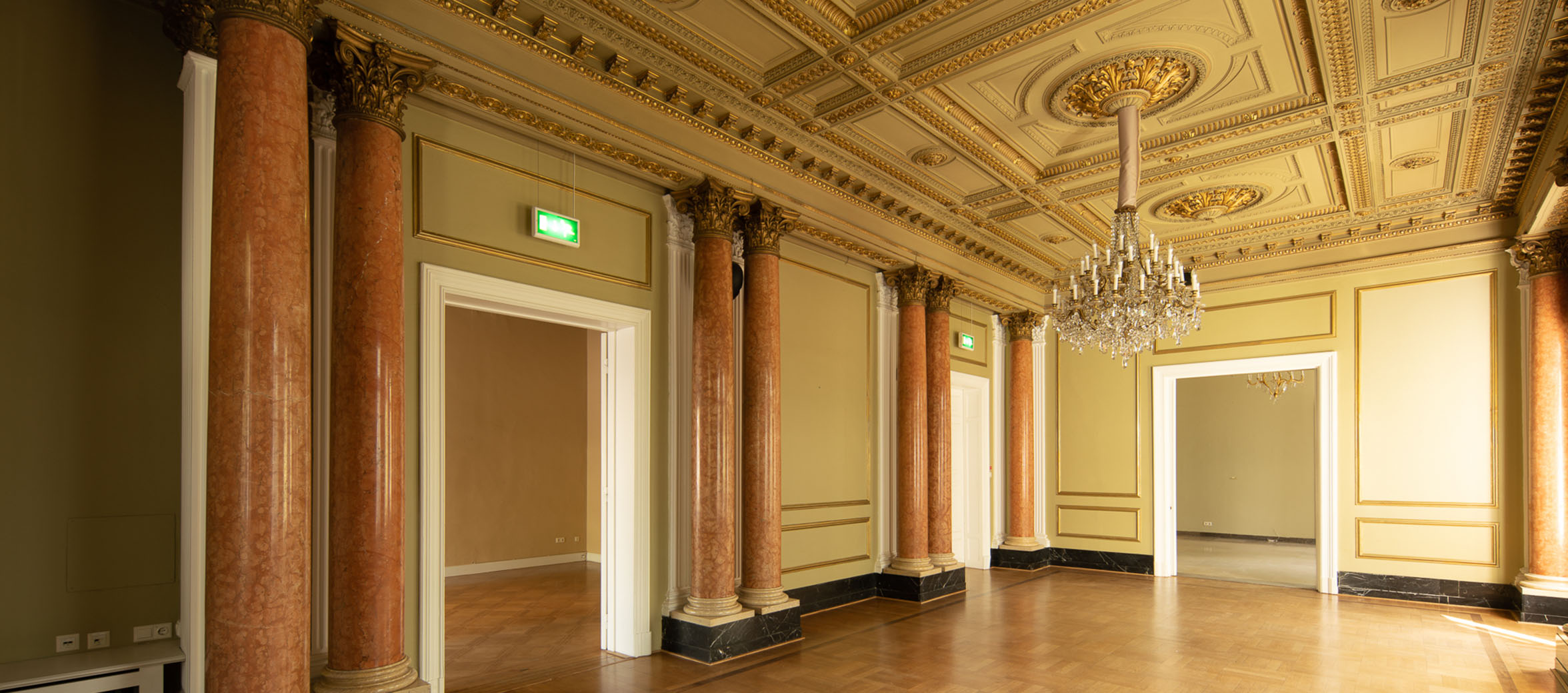 Room with a grand chandelier at the former U.S. Consulate General in Hamburg
