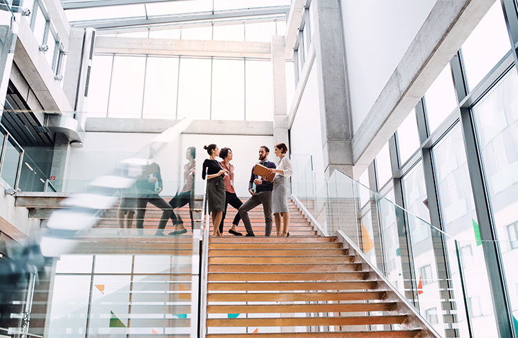 Office  - People standing on a staircase, talking